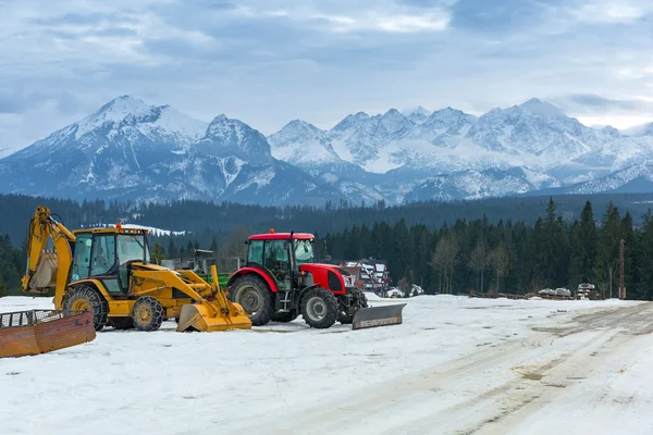 Bulldozers ready for winter in Tatra mountains — Stock Photo, Image
