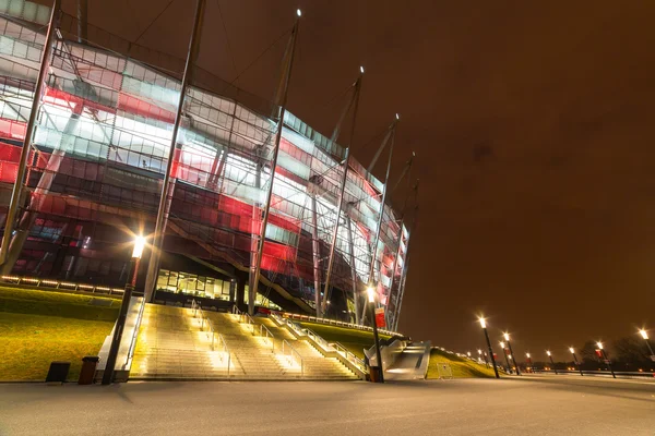 National Stadium in Warsaw illuminated at night by national colors, Poland Royalty Free Stock Images