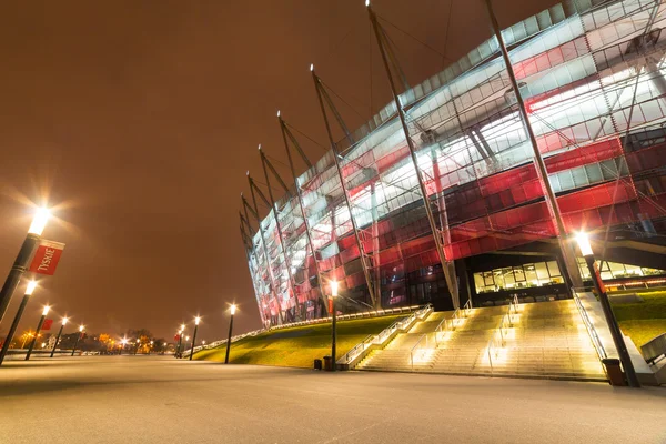 National Stadium in Warsaw illuminated at night by national colors, Poland Stock Image