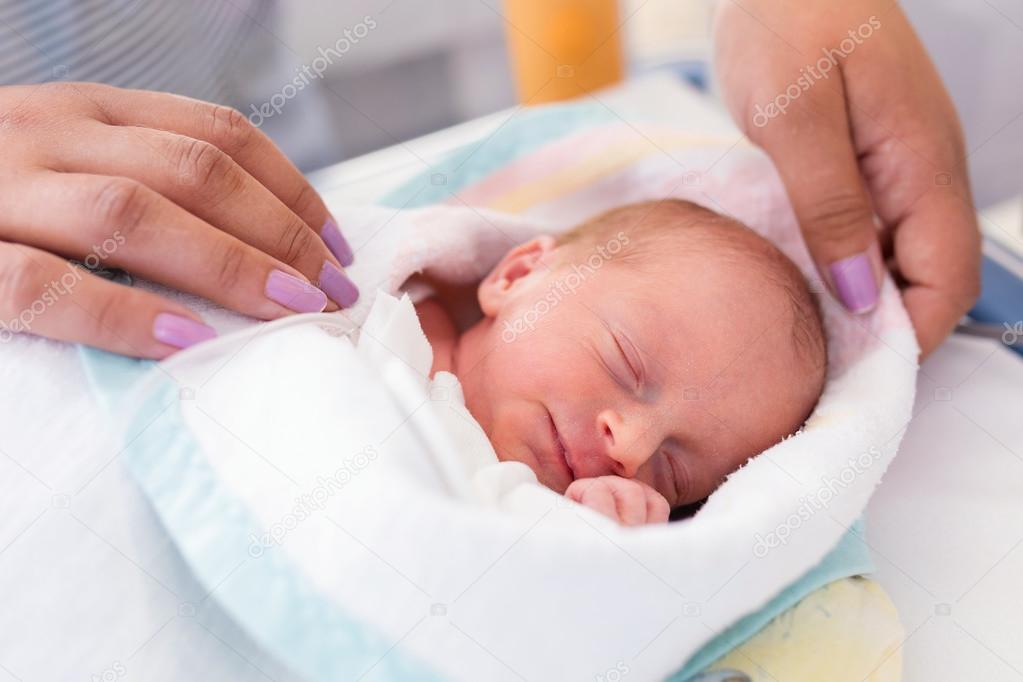 Newborn baby girl in the hospital