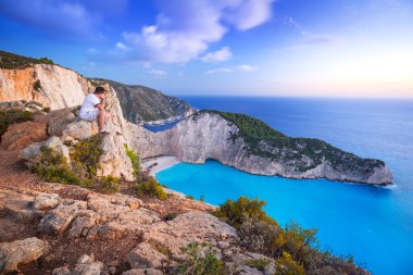 Manwatching sunset over Navagio beach