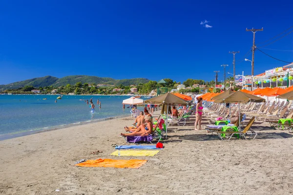 People on the beach of Laganas on Zakynthos island, Greece — Stok fotoğraf