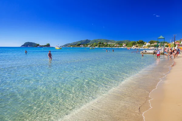 People on the beach of Laganas on Zakynthos island, Greece — Stok fotoğraf