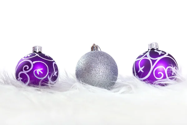 Purple and silver christmas baubles — Stock Photo, Image