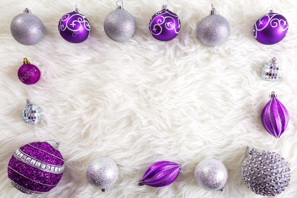 Frame made by purple and silver christmas baubles