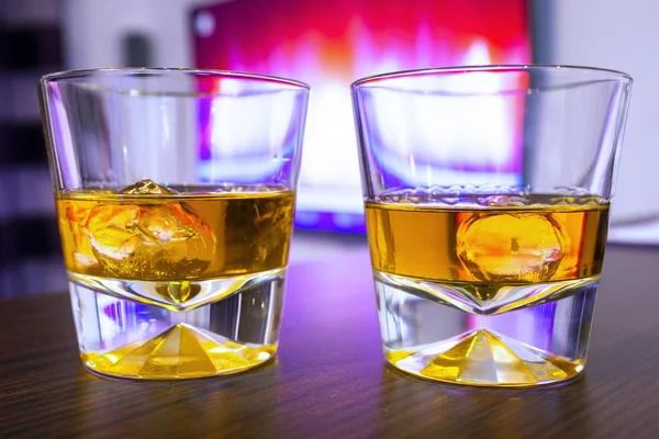 Glasses of scotch whiskey on rocks — Stock Photo, Image