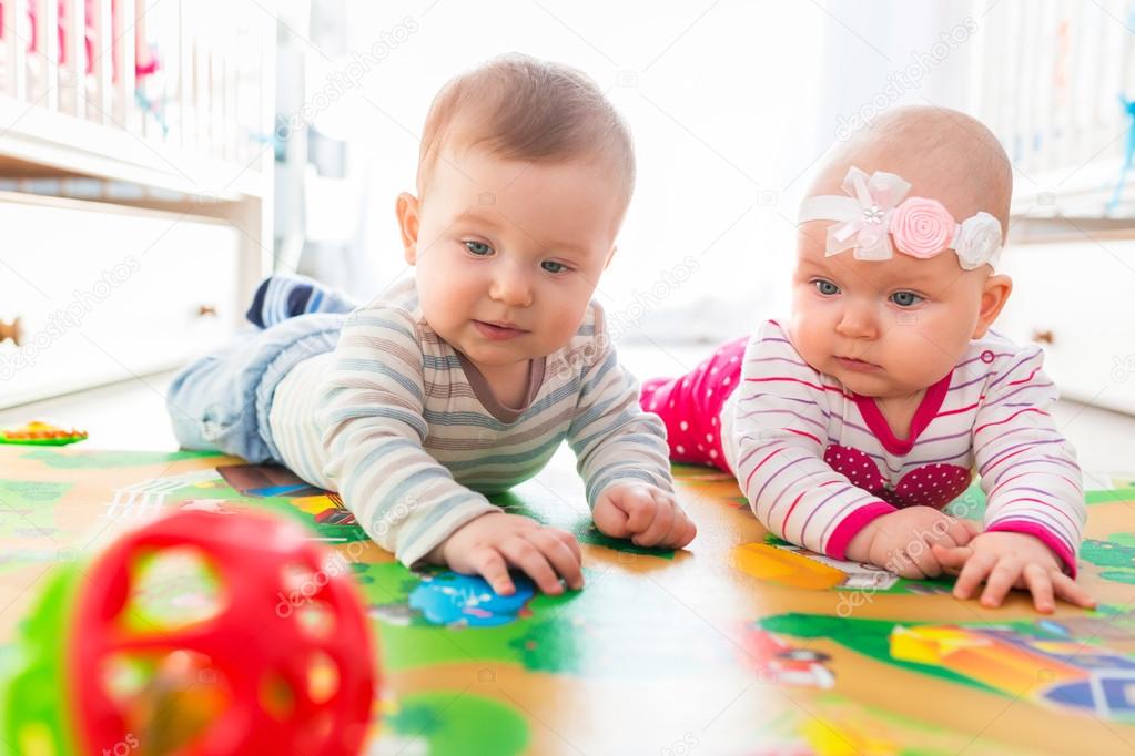 Baby Boy And Girl Twins Playing At Home Stock Photo By C Patryk Kosmider Baby Boy And Girl Twins Playing At Home Stock Photo By C Patryk Kosmider