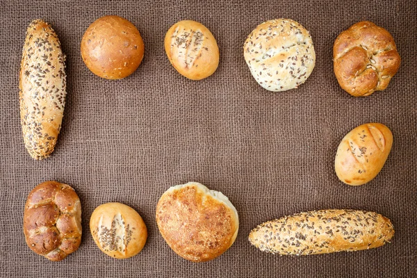 Different sorts of wholemeal breads and rolls — Stock Photo, Image