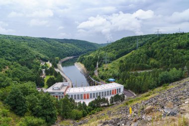 Dalesice Hydro Power Plant on the Jihlava River and in the background the cooling towers of nuclear power plants Dukovany, Trebic District, Czech republic, Europe. clipart