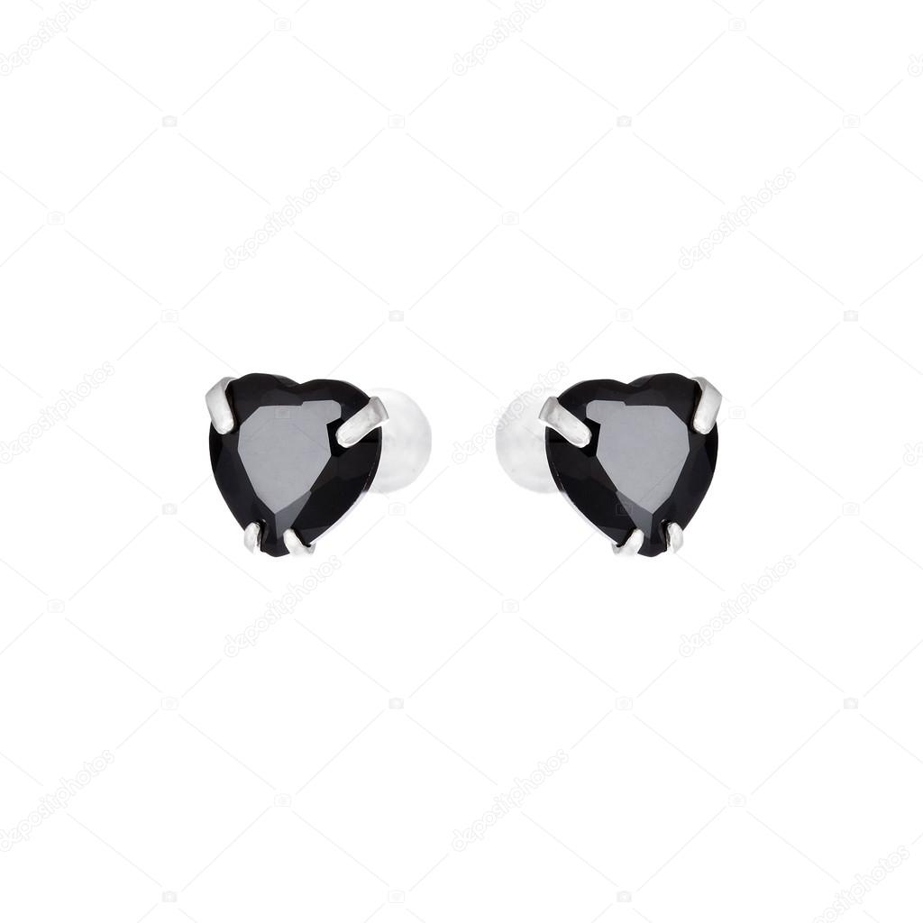 Earrings in the shape of heart isolated on white 