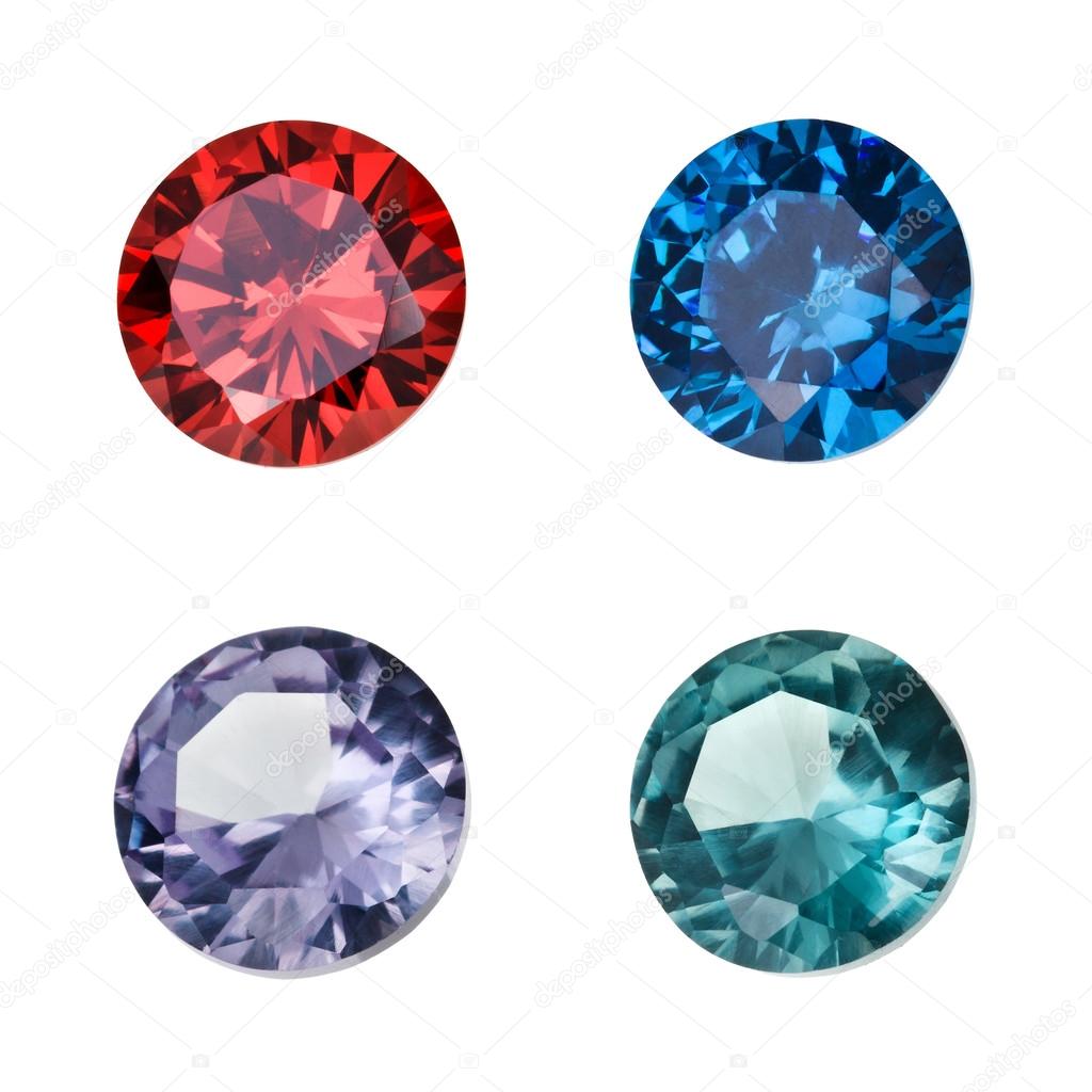 Set of colored gemstones isolated on white background