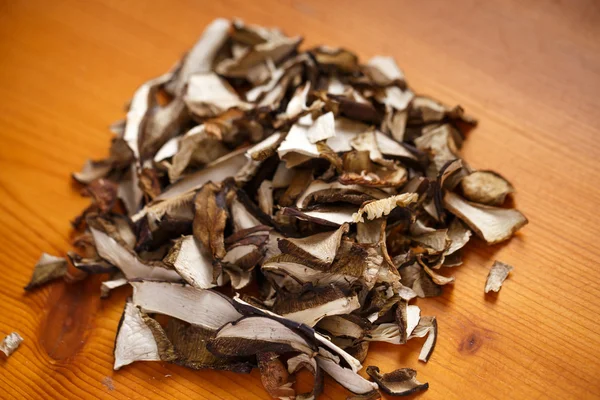 Dried mushrooms on a wooden table — Stock Photo, Image
