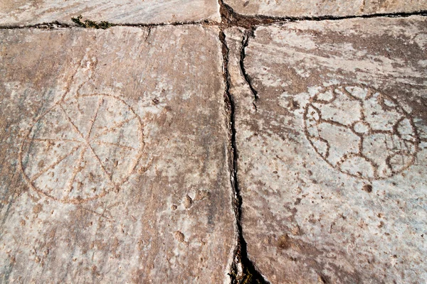 Símbolos de fundo de pedra antiga — Fotografia de Stock