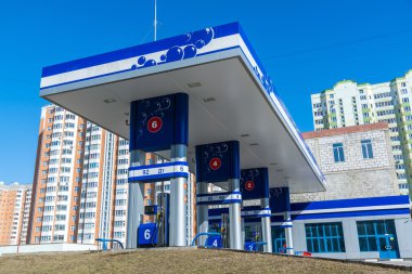 Balashikha, Russia - April 05.2016. gas station on  background of high-rise buildings