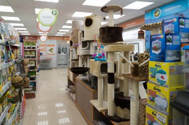 Moscow, Russia - April 16.2016. scratching posts in Four paws pet store clipart