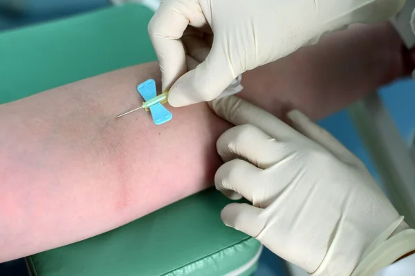 Blood sample from a vein in  child — Stock Photo, Image