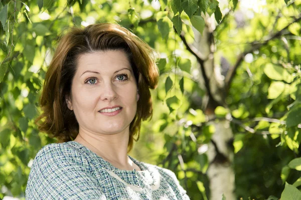 Portrait of Russian woman in abirch grove — Stock Photo, Image