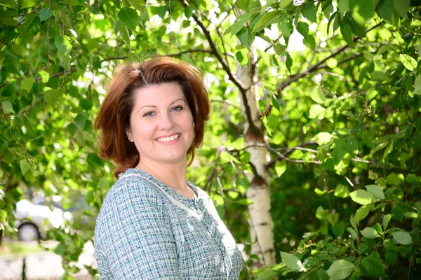 Russian woman in abirch grove — Stock Photo, Image