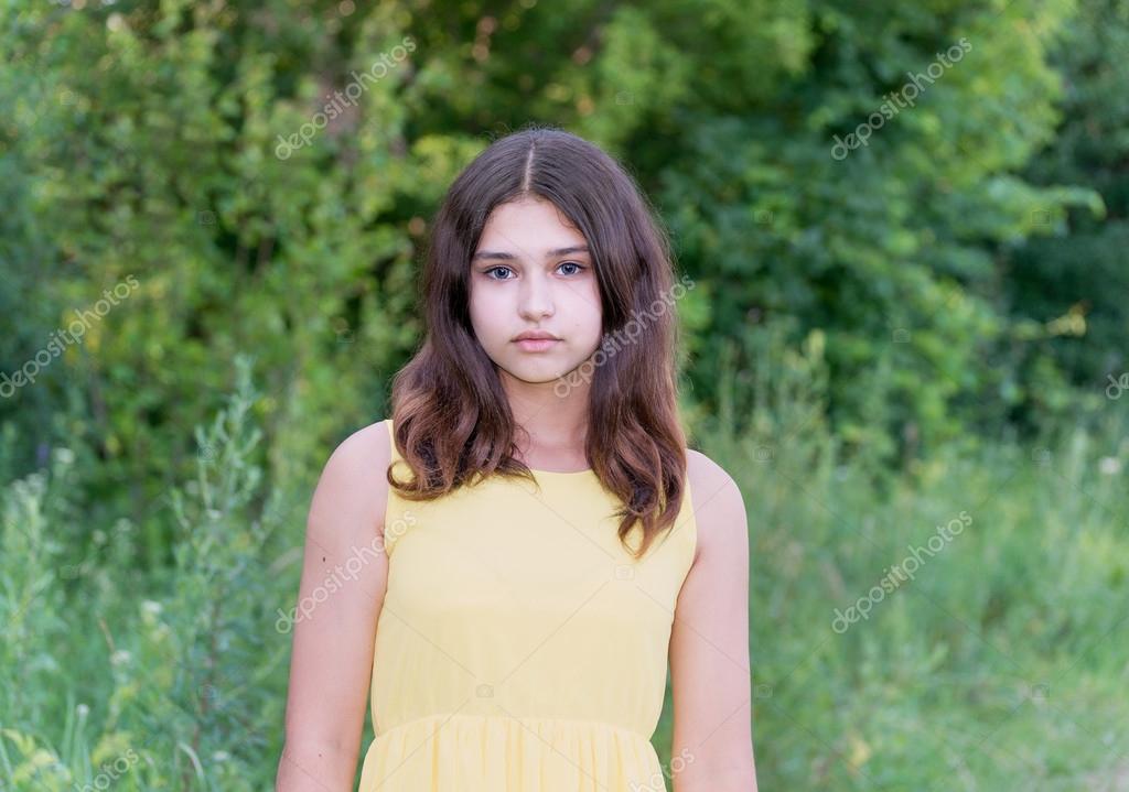 Pretty girl 14 years old posing on nature of summer Stock Photo by  ©olenka-2008 115734512