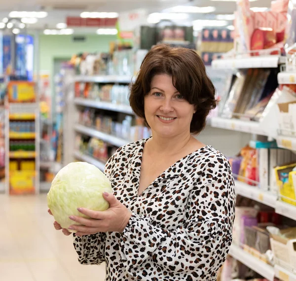 Woman at a grocery store in Russia