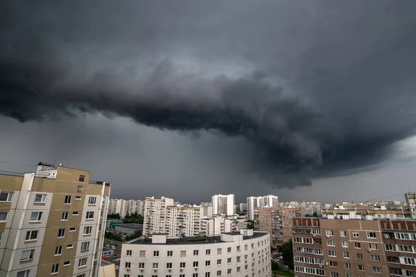 Round storm cloud over a city moscow, Russia