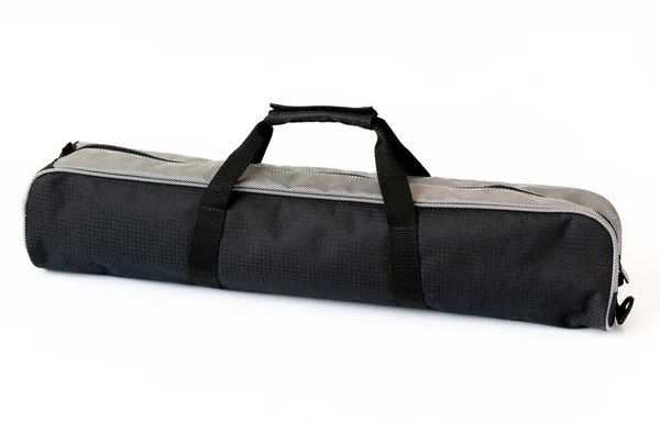 白い背景に長い黒い布のバッグ — ストック写真