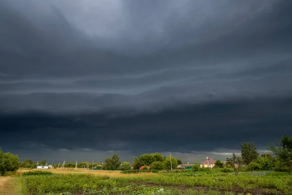 The Summer countryside landscape with a thundercloud — Stock Photo, Image