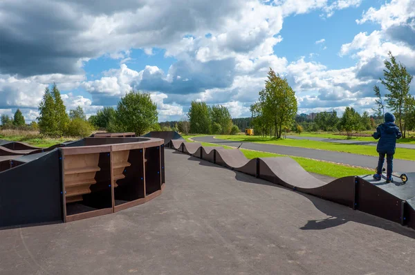 Pump track for extreme riding on scooters, skateboards and rollerblades in Zelenograd in Moscow, Russia