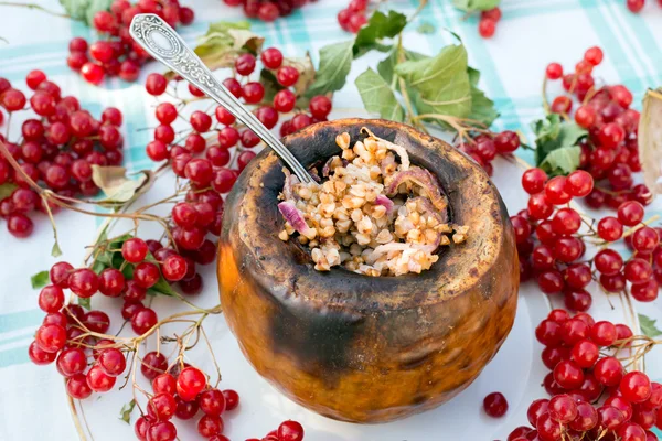 Pumpkin stuffed with buckwheat and onions — Stock Photo, Image