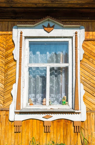 Carved window in old russian  country house — Stock Photo, Image