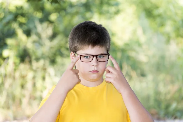 Portrait of 10-year-old boy in  park — Stock Photo, Image