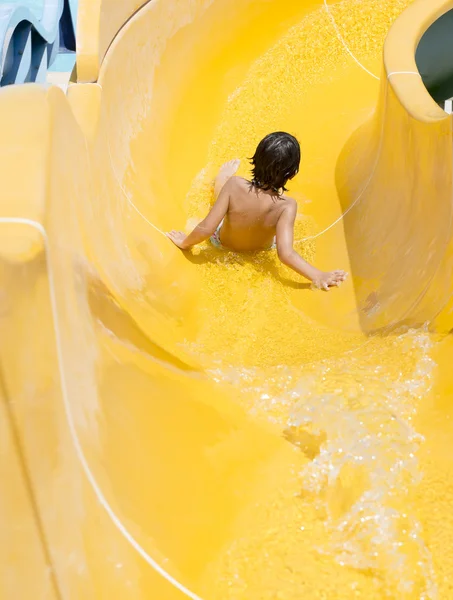 Children play on the water slide — Stock Photo, Image