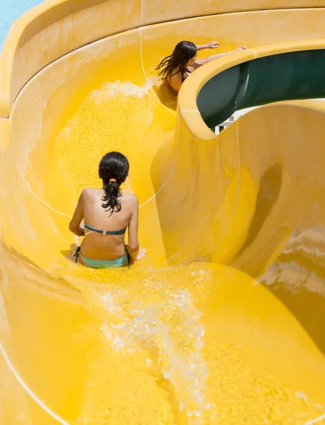 Children play on the water slide — Stock Photo, Image