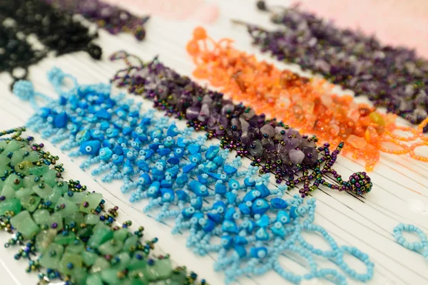 Beautiful beads and bracelets made of a  stone onyx — Stock Photo, Image