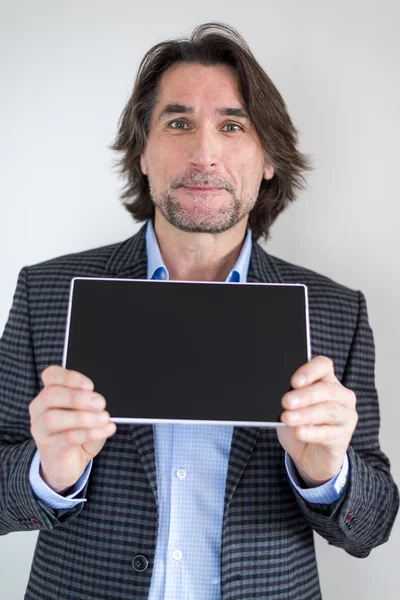 Man with the tablet in his hands — Stock Photo, Image