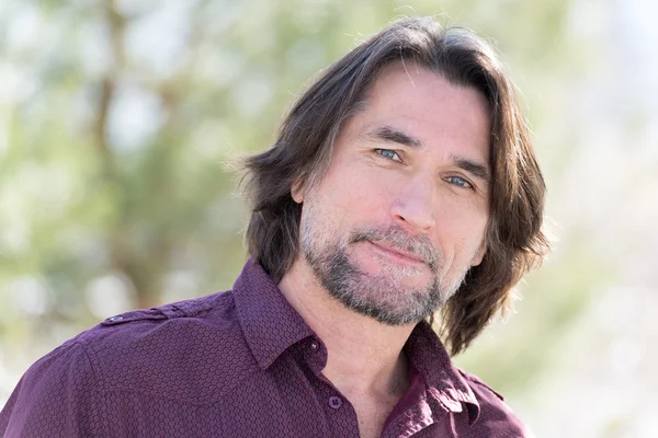 Portrait of a middle-aged man in nature — Stock Photo, Image