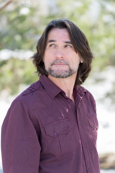 Portrait of a middle-aged man in nature — Stock Photo, Image