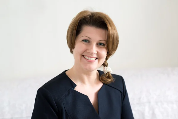 Portrait of a woman in blue dress — Stock Photo, Image