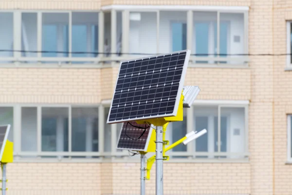 Street lamp powered by solar batteries