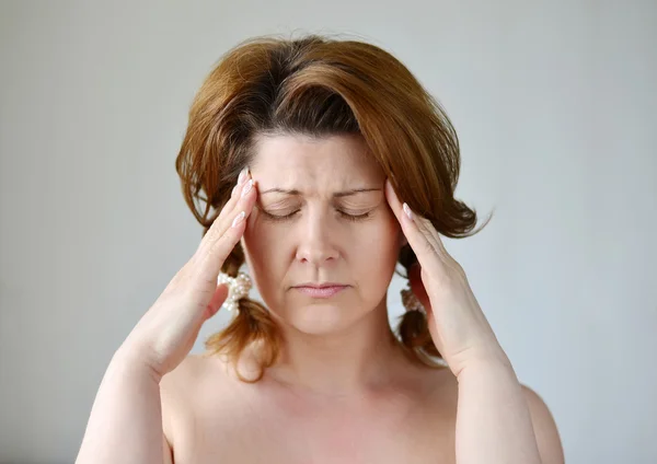 Woman holding hands on  head, depression, pain, migraine — Stock Photo, Image