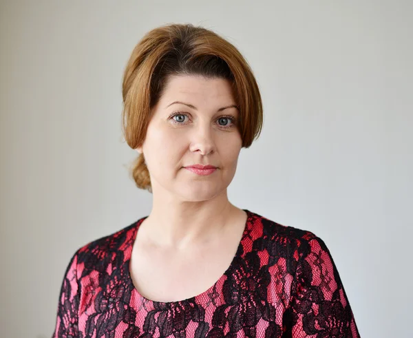 Portrait of a woman in  red dress — Stock Photo, Image