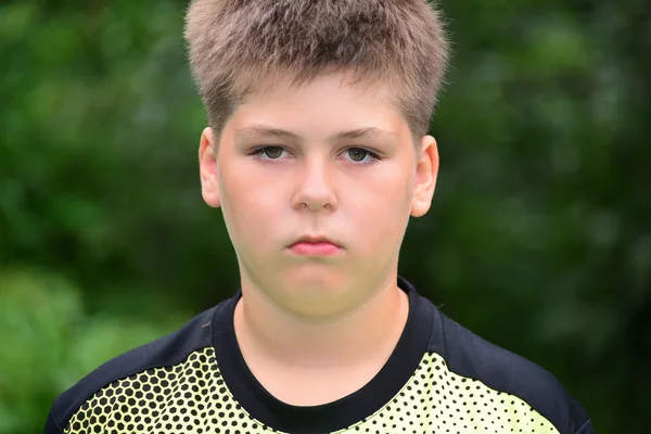 Portrait of boy unhappy on the nature — Stock Photo, Image