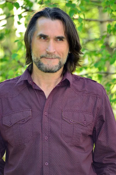 Portrait of amiddle aged man in nature — Stock Photo, Image