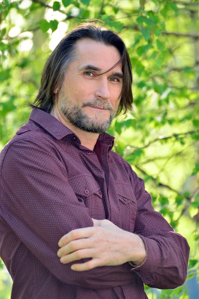 Portrait of amiddle aged man in nature — Stock Photo, Image