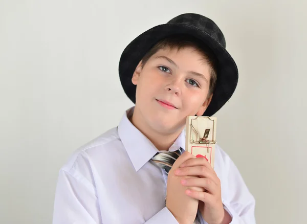 Boy teenager with a mousetrap in hands of — Stock Photo, Image