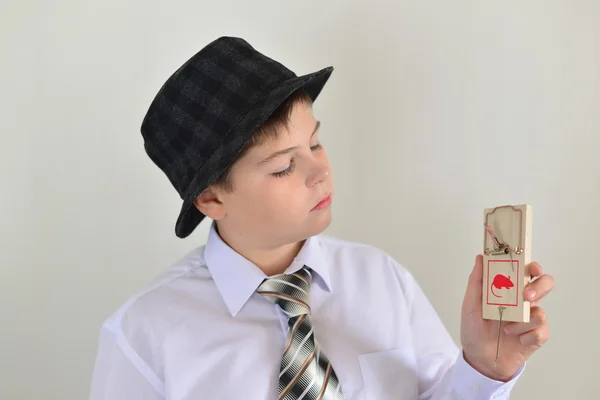 Boy teenager with a mousetrap in hands of — Stock Photo, Image