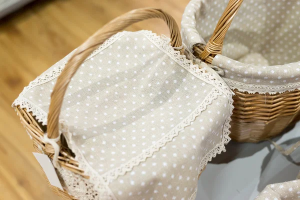 Wicker basket covered with a cloth — Stok fotoğraf