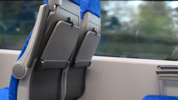 Treno moderno con sedili blu in movimento — Video Stock