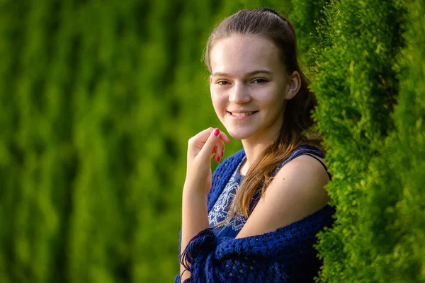 A young woman in a summer park Stok Resim