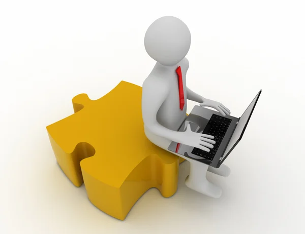 3d  man with a laptop and pieces of puzzle. — Stock Photo, Image